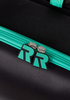 Black and green “RR” (Roll Rider logo) zipper pull. 