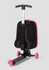Rear angle of a black and pink Roll Rider scooter suitcase with the handle up on a white background. 